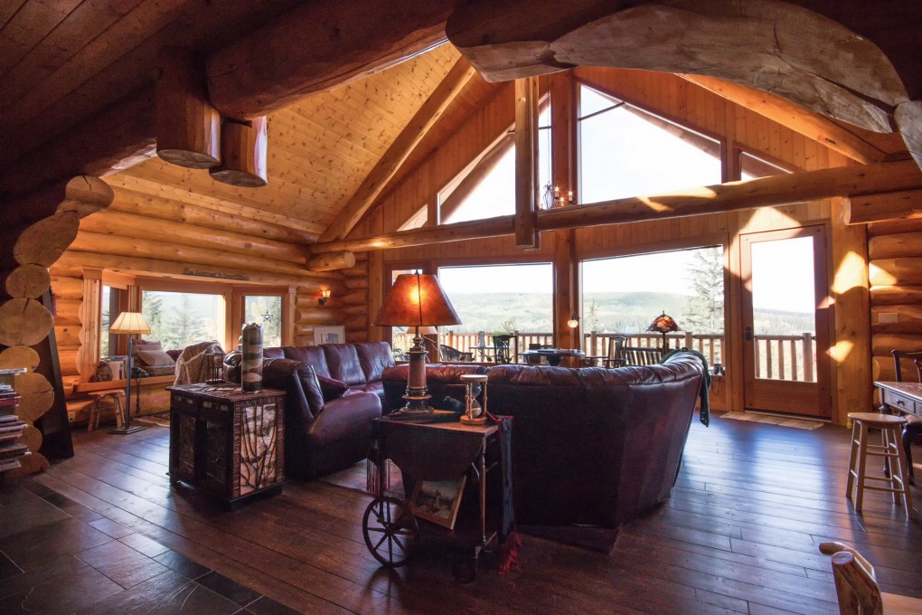 1-luxury-log-home-for-sale-living-area-with-picture-wondows